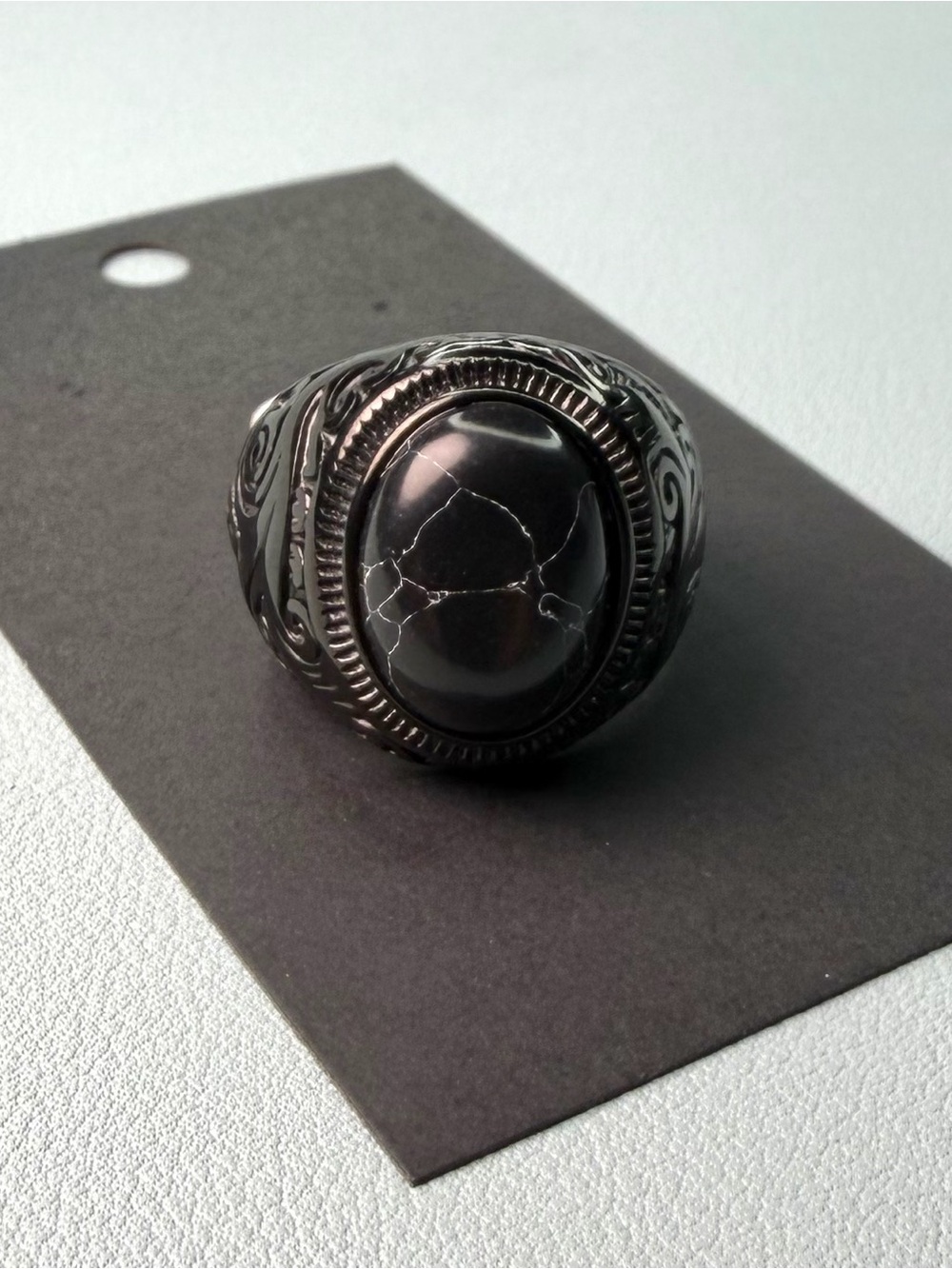 Men's Black Stone Signet Ring with Intricate Metalwork
